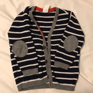 Navy and white cardigan with orange and grey trim